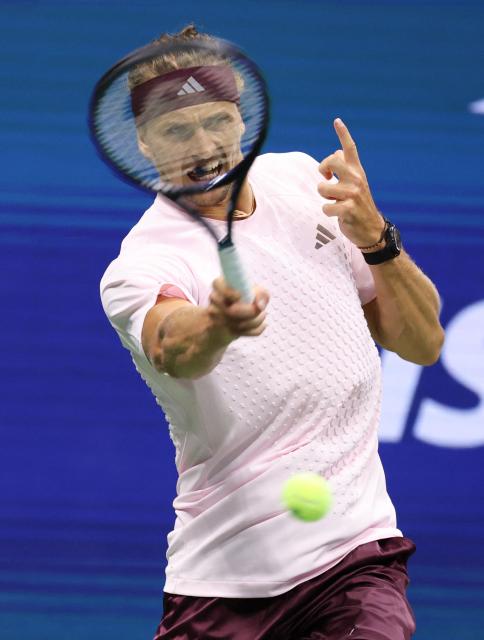 Germany's Alexander Zverev hits a return to Chile's Alejandro Tabilo during their men's singles third-round tennis match on day seven of the US Open tennis tournament at the USTA Billie Jean King National Tennis Center in New York City on September 5, 2026. (Photo by Leonardo MUNOZ / AFP)