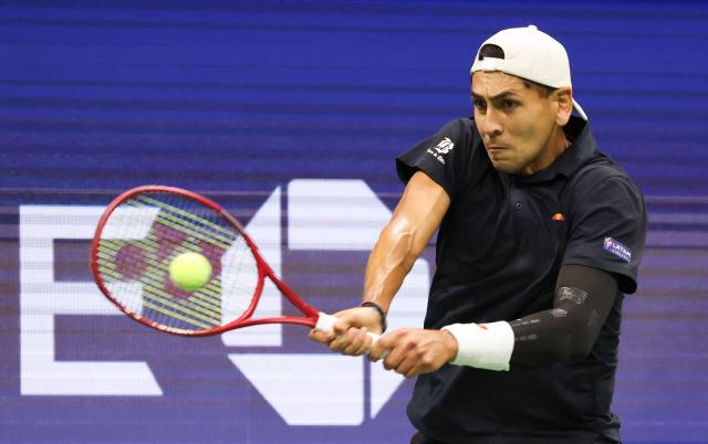 Chile's Alejandro Tabilo hits a return to Germany's Alexander Zverev during their men's singles third round tennis match on day seven of the US Open tennis tournament at the USTA Billie Jean King National Tennis Center in New York City on September 5, 2026. (Photo by Leonardo MUNOZ / AFP)