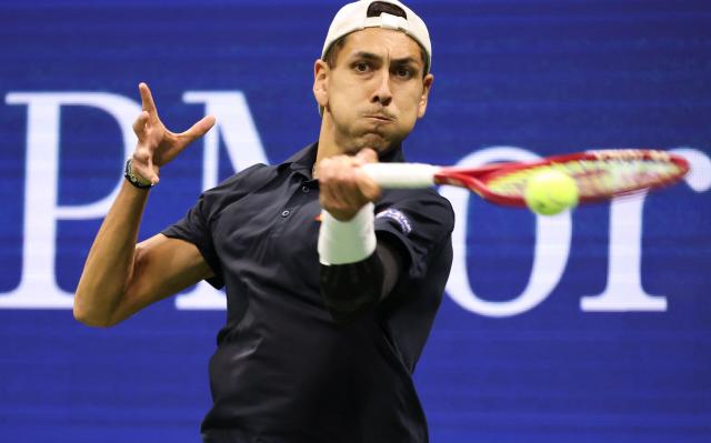 Chile's Alejandro Tabilo hits a return to Germany's Alexander Zverev during their men's singles third round tennis match on day seven of the US Open tennis tournament at the USTA Billie Jean King National Tennis Center in New York City on September 5, 2026. (Photo by Leonardo MUNOZ / AFP)
