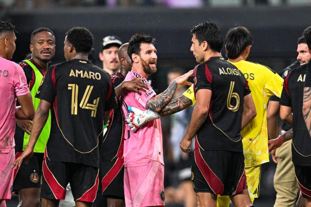 Inter Miami's Argentine forward #10 Lionel Messi (C/L) argues with Atlanta United's Paraguayan defender #6 Junior Alonso (C/R) during a Major League Soccer (MLS) regular season football match between Inter Miami CF and Atlanta United FC at Nu Stadium in Miami, Florida, on September 5, 2026. (Photo by CHANDAN KHANNA / AFP)
