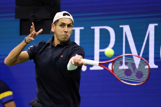 Chile's Alejandro Tabilo hits a return to Germany's Alexander Zverev during their men's singles third round tennis match on day seven of the US Open tennis tournament at the USTA Billie Jean King National Tennis Center in New York City on September 5, 2026. (Photo by Leonardo MUNOZ / AFP)