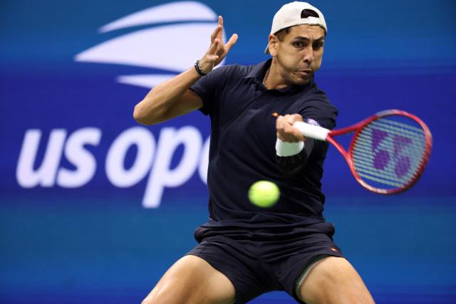 Chile's Alejandro Tabilo hits a return to Germany's Alexander Zverev during their men's singles third round tennis match on day seven of the US Open tennis tournament at the USTA Billie Jean King National Tennis Center in New York City on September 5, 2026. (Photo by Leonardo MUNOZ / AFP)