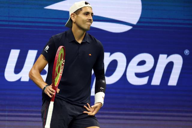 Chile's Alejandro Tabilo reacts during his men's singles third round tennis match against Germany's Alexander Zverev on day seven of the US Open tennis tournament at the USTA Billie Jean King National Tennis Center in New York City on September 5, 2026. (Photo by Leonardo MUNOZ / AFP)
