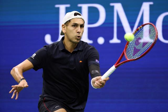 Chile's Alejandro Tabilo hits a return to Germany's Alexander Zverev during their men's singles third round tennis match on day seven of the US Open tennis tournament at the USTA Billie Jean King National Tennis Center in New York City in the early hours of September 6, 2026. (Photo by Leonardo MUNOZ / AFP)