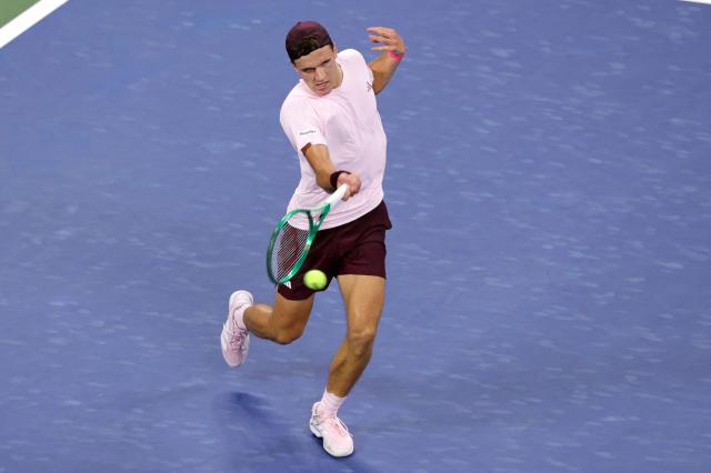 Czech Republic's Jakub Mensik hits a return to USA's Learner Tien during their men's singles third round tennis match on day seven of the US Open tennis tournament at the USTA Billie Jean King National Tennis Center in New York City on September 5, 2026. (Photo by KENA BETANCUR / AFP)