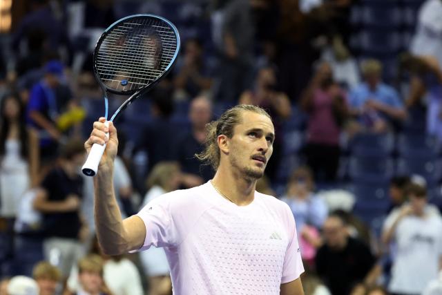 Germany's Alexander Zverev waves his racquet to the crowd after defeating Chile's Alejandro Tabilo during their men's singles third-round tennis match on day seven of the US Open tennis tournament at the USTA Billie Jean King National Tennis Center in New York City in the early hours of September 6, 2026. (Photo by Leonardo MUNOZ / AFP)