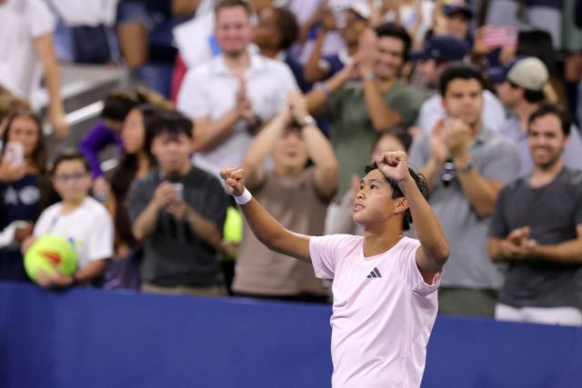 USA's Learner Tien celebrates defeating Czech Republic's Jakub Mensik during their men's singles third round tennis match on day seven of the US Open tennis tournament at the USTA Billie Jean King National Tennis Center in New York in the early hours of September 6, 2026, (Photo by KENA BETANCUR / AFP)