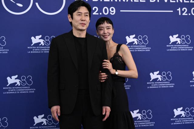 Actor Sul Kyung-gu and actress Jeon Do-yeon attend the photocall of "Possible Love" (Ga-Neung-han sa-rang) presented in competition at the 83rd International Venice Film Festival, at Venice Lido on September 6, 2026. (Photo by Tiziana FABI / AFP)