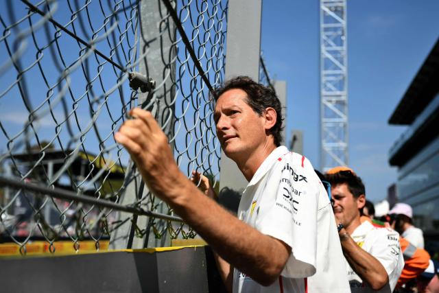 Stellantis' Chairman and Exor CEO, representative of Juventus’s controlling ownership, John Elkann watches watches from the pit lane of the Autodromo Nazionale Monza circuit ahead of the Italian Formula One Grand Prix in Monza, northern Italy on September 6, 2026. (Photo by Marco BERTORELLO / AFP)