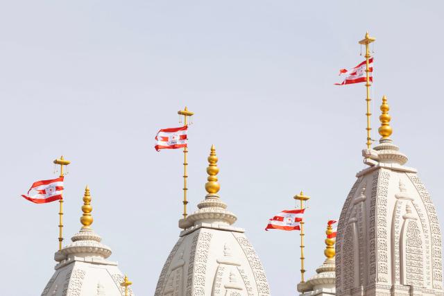 This photograph shows a view of the newly consecrated BAPS (Bochasanwasi Akshar Purushottam Swaminarayan Sanstha) Hindu temple in Bussy-Saint-Georges on September 6, 2026. On September 6, 2026, thousands of Hindus are celebrating the consecration of the first major temple built in France by the BAPS organization, which promotes it as 'an emblem of Indian culture and Hinduism.' Hailed as the largest Hindu temple built in continental Europe in a traditional style, the edifice stands in the new town of Bussy-Saint-Georges (Seine-et-Marne), 30 km east of the capital. (Photo by Kenzo TRIBOUILLARD / AFP)