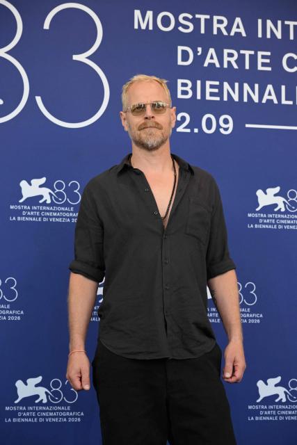 Danish actor Carsten Bjoernlund attends the photocall of "Woman Unknown" (Kvinde Ukendt) presented in competition at the 83rd International Venice Film Festival, at Venice Lido on September 6, 2026. (Photo by Tiziana FABI / AFP)