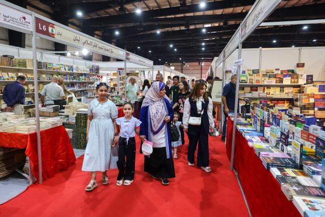 Iraqis visit the Baghdad International Book Fair in Baghdad on September 6, 2026. (Photo by AHMAD AL-RUBAYE / AFP)