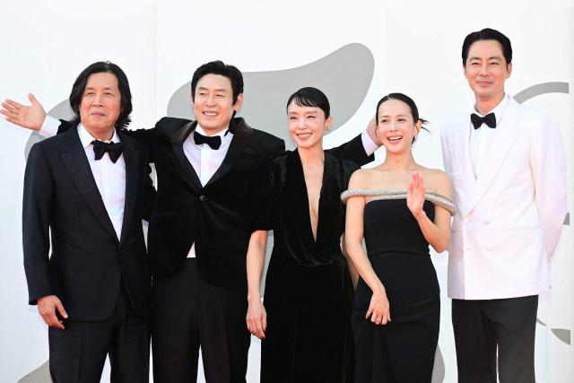 (From L) Director Lee Chang-Dong, actor Sul Kyung-gu, actress Jeon Do-yeon, South korean actress Cho Yeo-Jeong and South Korean actor Zo In-Sung attend the red carpet event for the screening of "Possible Love" (Ga-Neung-han sa-rang) presented in competition at the 83rd International Venice Film Festival, at Venice Lido on September 6, 2026. (Photo by Stefano Rellandini / AFP)