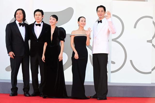 (From L) Director Lee Chang-Dong, actor Sul Kyung-gu, actress Jeon Do-yeon, South korean actress Cho Yeo-Jeong and South Korean actor Zo In-Sung attend the red carpet event for the screening of "Possible Love" (Ga-Neung-han sa-rang) presented in competition at the 83rd International Venice Film Festival, at Venice Lido on September 6, 2026. (Photo by Stefano Rellandini / AFP)