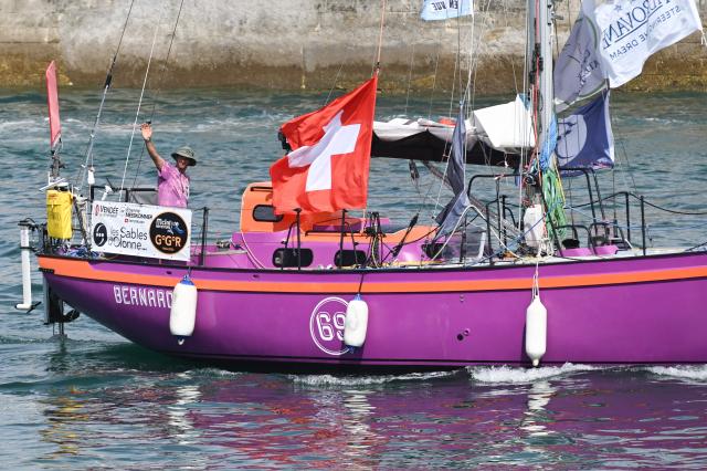 Swiss skipper Etienne Messikommer leaves Les Sables-d'Olonne before the departure of the Golden Globe Race (GGR) , in Les Sables d’Olonne, western France, on September 6,  2026. The Golden Globe Race is a around the world solo sailing race without any electronic assistance . (Photo by Sebastien Salom-Gomis / AFP)