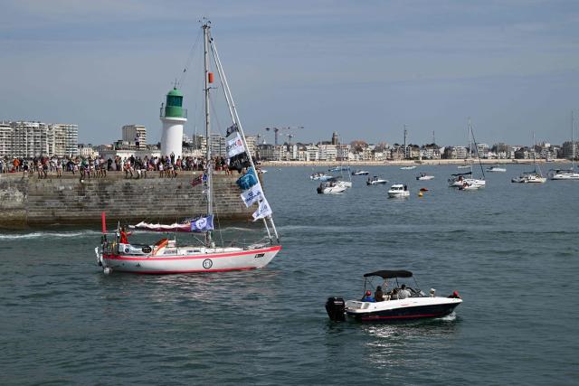 Norwegian skipper Helga Marie leaves Les Sables-d'Olonne before the departure of the Golden Globe Race (GGR) , in Les Sables d’Olonne, western France, on September 6,  2026. The Golden Globe Race is a around the world solo sailing race without any electronic assistance . (Photo by Sebastien Salom-Gomis / AFP)