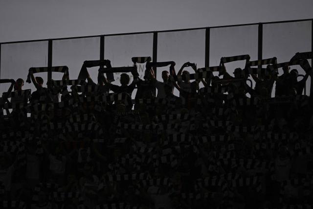 Frankfurt fans display their scarves prior to the German first division Bundesliga football match between Eintracht Frankfurt and FC Augsburg in Frankfurt am Main, western Germany, on September 6, 2026. (Photo by Kirill KUDRYAVTSEV / AFP) / DFL REGULATIONS PROHIBIT ANY USE OF PHOTOGRAPHS AS IMAGE SEQUENCES AND/OR QUASI-VIDEO