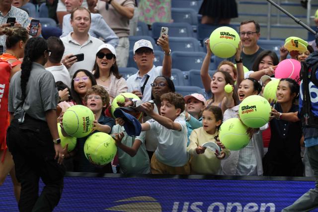 People wait to greet Belarus's Aryna Sabalenka (L) after defeating US's Taylor Townsend during their women's singles round of 16 tennis match  on day eight of the US Open tennis tournament at the USTA Billie Jean King National Tennis Center in New York City on September 6, 2026. USA's Serena Williams and Spain's Carlos Alcaraz wave to the crowd after being defeated by Switzerland's Belinda Bencic and Italy's Flavio Cobolli in their mixed doubles tennis match at the 2026 US Open tennis tournament at the USTA Billie Jean King National Tennis Center in New York on August 25, 2026. (Photo by TIMOTHY A. CLARY / AFP)