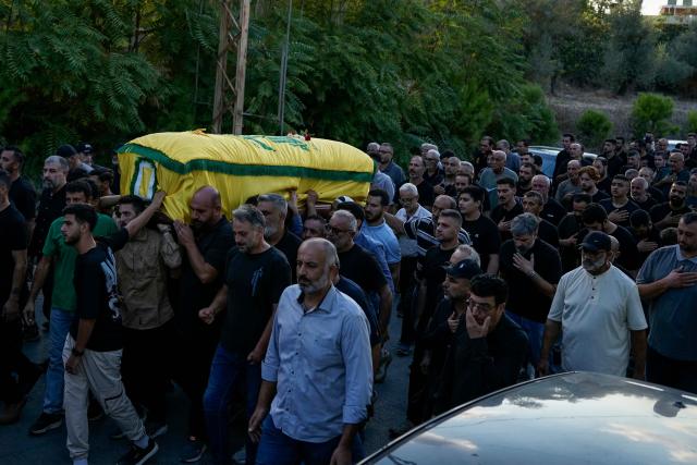 Mourners carry the casket of Israa Bahjat, one of two women killed earlier in an Israeli strike on the village of Arabsalim, during her funeral in the southern Lebanese village of Jibshit on September 6, 2026. Lebanon’s Health Ministry said on September 6 that four people were killed in Israeli strikes in the south of the country, while Israel said it had carried out raids following a Hezbollah drone attack targeting its soldiers. (Photo by Ammar Ammar / AFP) / 