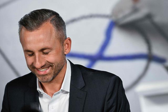 Ulrich Siegmund, top candidate in the Saxony-Anhalt state election for the far-right Alternative for Germany (AfD) is interviewed after exit poll results were announced on public broadcaster ZDF at the fair grounds during Saxony-Anhalt's state elections in Magdeburg, eastern Germany on September 6, 2026. Germany's far-right AfD won key regional elections September 6, 2026 by a landslide with at least 44 percent of the vote in the eastern state of Saxony-Anhalt, said exit polls by two public broadcasters. (Photo by Tobias SCHWARZ / AFP)