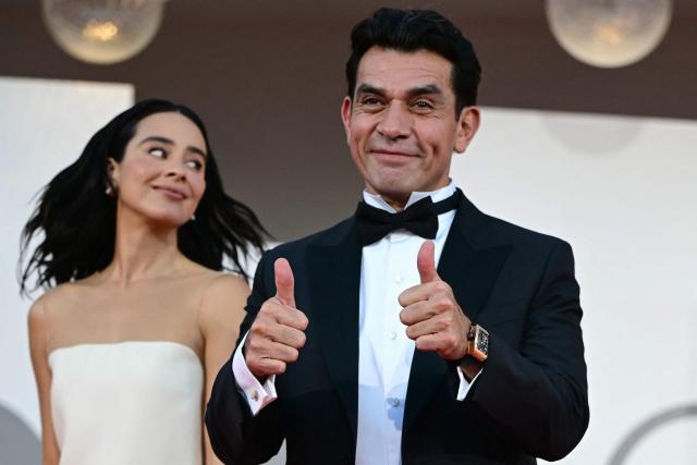 Actress Esmeralda Pimentel, and actor Jorge Salinas, cast members of the movie “Hombre Al Agua”, attend the red carpet event before the screening of "The Echo chamber" presented in competition at the 83rd International Venice Film Festival, at Venice Lido on September 6, 2026. (Photo by Stefano Rellandini / AFP)