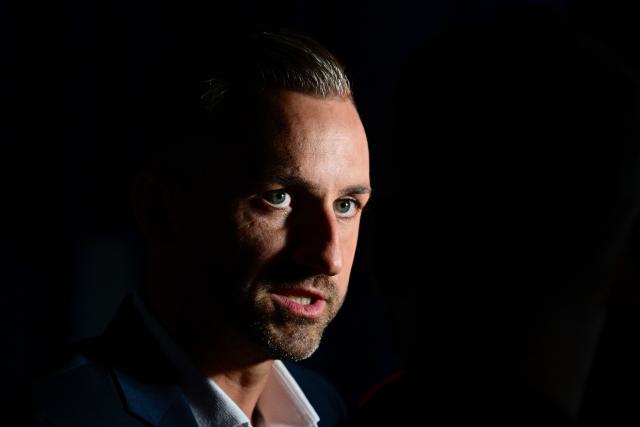 Ulrich Siegmund, top candidate in the Saxony-Anhalt state election for the far-right Alternative for Germany (AfD) is pictured after exit poll results were announced on public broadcaster ZDF at the fair grounds during Saxony-Anhalt's state elections in Magdeburg, eastern Germany on September 6, 2026. Germany's far-right AfD won key regional elections September 6, 2026 by a landslide with at least 44 percent of the vote in the eastern state of Saxony-Anhalt, said exit polls by two public broadcasters. (Photo by John MACDOUGALL / AFP)