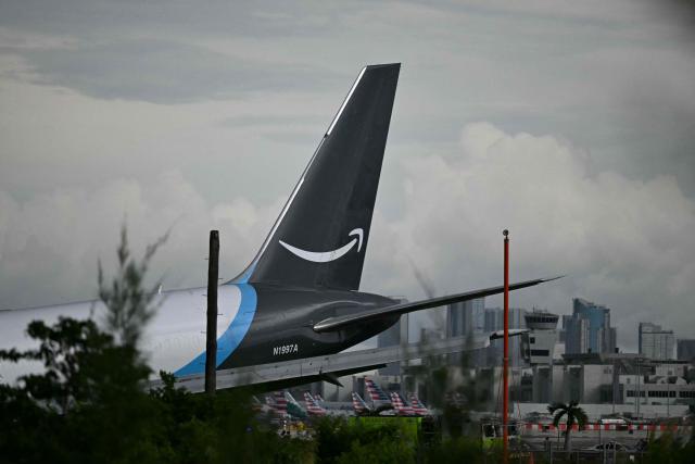 The tail section of a cargo plane is seen at Miami International Airport after it overran the runway at Miami International Airport in Miami, Florida, on September 6, 2026. (Photo by CHANDAN KHANNA / AFP)