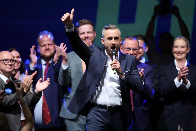 Ulrich Siegmund, far-right Alternative for Germany (AfD)'s main candidate in the Saxony-Anhalt state election, gestures as he addresses supporters at the AfD's election party following Saxony-Anhalt's state elections in Magdeburg, eastern Germany on September 6, 2026. Germany's far-right AfD won a landslide victory in a key regional election on September 6 in the ex-communist east, according to exit polls, but it remain unclear whether it can win an absolute majority to govern. (Photo by Ronny HARTMANN / AFP)