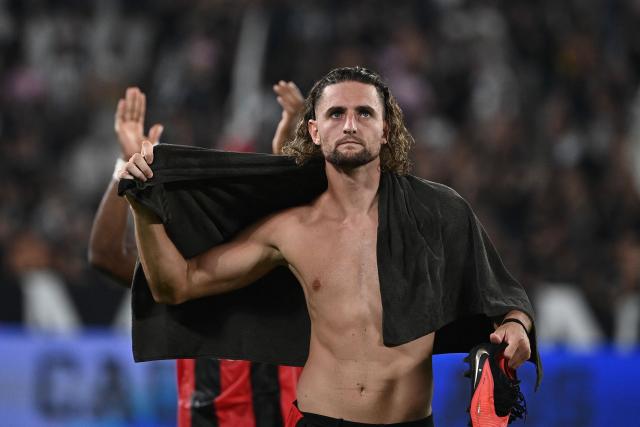 AC Milan's French midfielder #12 Adrien Rabiot leaves the pitch at the end of the Italian Serie A football match between Juventus and AC Milan at the Allianz Stadium in Turin on September 6, 2026. (Photo by Isabella BONOTTO / AFP)