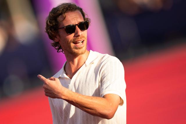 French critic and documentary director Adrien Denouette reacts on the red carpet during the 52nd edition of the Deauville American film festival, in Deauville, northwestern France on September 6, 2026. (Photo by Guillaume SALIGOT / AFP)