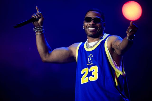 US rapper Nelly performs during the third day of Rock in Rio music festival at Rio 2016 Olympic Park in Rio de Janeiro, Brazil on September 6, 2026. (Photo by MAURO PIMENTEL / AFP)