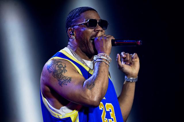 US rapper Nelly performs during the third day of Rock in Rio music festival at Rio 2016 Olympic Park in Rio de Janeiro, Brazil on September 6, 2026. (Photo by MAURO PIMENTEL / AFP)