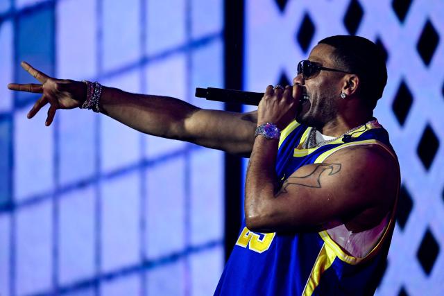 US rapper Nelly performs during the third day of Rock in Rio music festival at Rio 2016 Olympic Park in Rio de Janeiro, Brazil on September 6, 2026. (Photo by MAURO PIMENTEL / AFP)