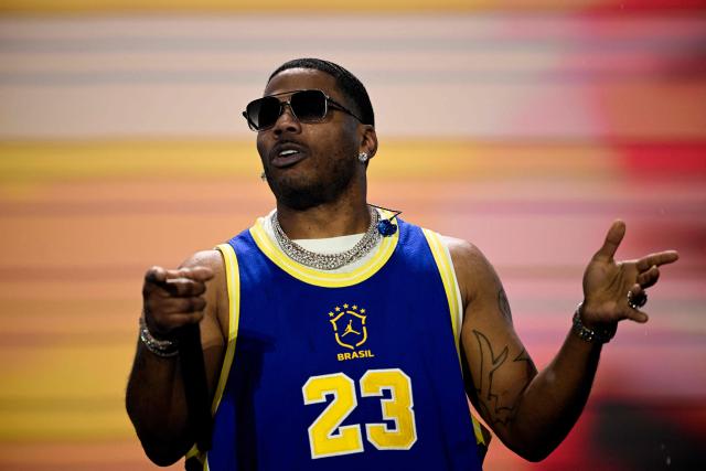 US rapper Nelly performs during the third day of Rock in Rio music festival at Rio 2016 Olympic Park in Rio de Janeiro, Brazil on September 6, 2026. (Photo by MAURO PIMENTEL / AFP)