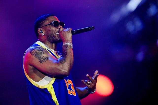 US rapper Nelly performs during the third day of Rock in Rio music festival at Rio 2016 Olympic Park in Rio de Janeiro, Brazil on September 6, 2026. (Photo by MAURO PIMENTEL / AFP)