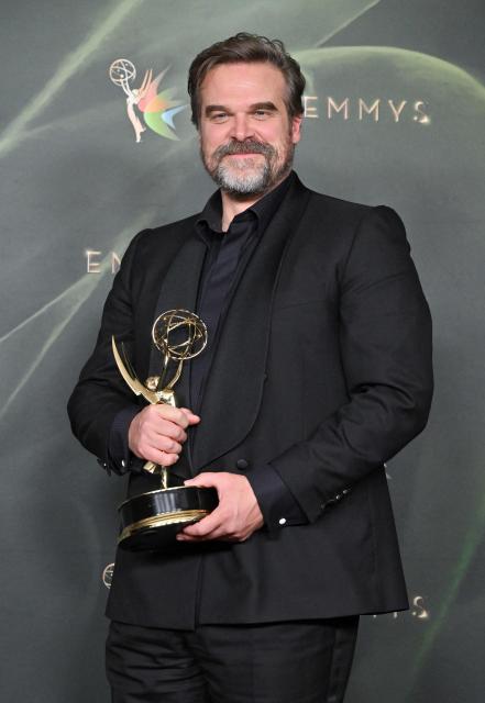 US actor David Harbour winner of Outstanding Supporting Actor in a Limited or Anthology Series or Movie for "DTF St. Louis" poses with his Emmy during Night Two of the 78th Emmy Awards at the Peacock Theater in Los Angeles on September 6, 2026. (Photo by LISA O'CONNOR / AFP)