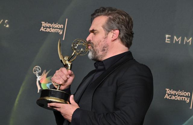US actor David Harbour winner of Outstanding Supporting Actor in a Limited or Anthology Series or Movie for "DTF St. Louis" poses with his Emmy during Night Two of the 78th Emmy Awards at the Peacock Theater in Los Angeles on September 6, 2026. (Photo by LISA O'CONNOR / AFP)