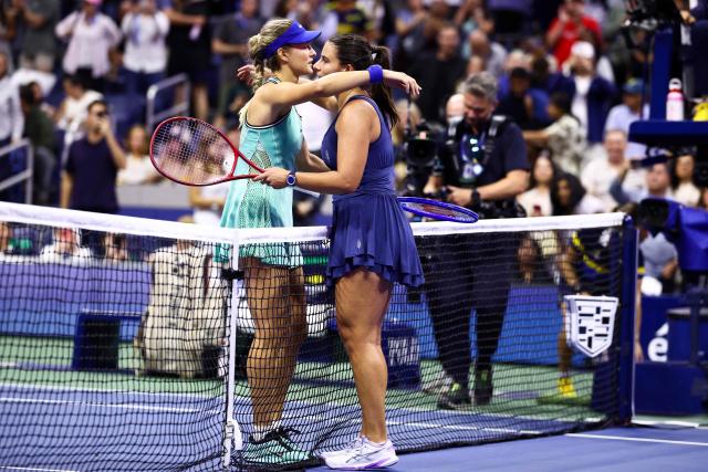Russia's Anna Kalinskaya hugs USA's Emma Navarro after the women's singles round of 16 tennis match on day eight of the US Open tennis tournament at the USTA Billie Jean King National Tennis Center in New York City on September 6, 2026. (Photo by CHARLY TRIBALLEAU / AFP)