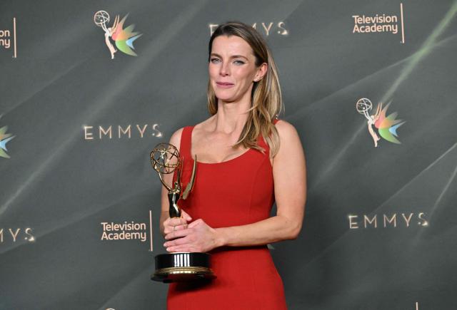 US actress Betty Gilpin winner of Outstanding Guest Actress in a Comedy Series for "Widow's Bay" poses with her Emmy during Night Two of the 78th Emmy Awards at the Peacock Theater in Los Angeles on September 6, 2026. (Photo by LISA O'CONNOR / AFP)
