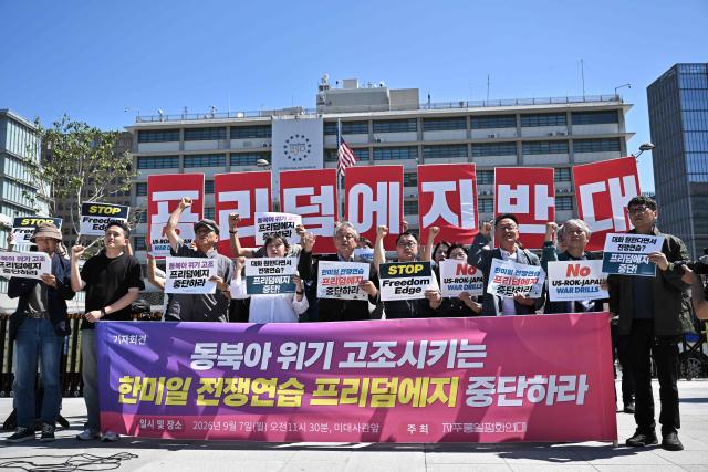 Members of the Korean Peace Solidarity for Sovereignty and Reunification protest against the South Korea, US and Japan trilateral joint military exercise “Freedom Edge”, in front of the US Embassy in Seoul on September 7, 2026. (Photo by Lillian SUWANRUMPHA / AFP)