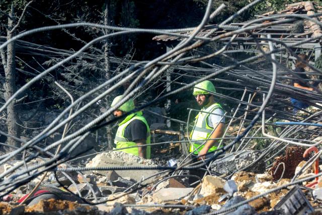 Rescuers search for survivors amidst the rubble following an overnight Israeli airstrike on the village of Kfar Roummane in southern Lebanon on September 7, 2026. Lebanese state media on September 7 reported that Israeli strikes overnight killed 11 people, including two infants, a day after separate raids left seven dead. (Photo by Mahmoud ZAYYAT / AFP) / 
