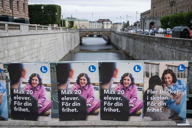 Election campaign posters featuring Liberal Party leader Simona Mohamsson are displayed outside the Swedish Parliament in Stockholm, Sweden, on September 7, 2026, ahead of Sweden’s general election on September 13. (Photo by Jonathan NACKSTRAND / AFP)
