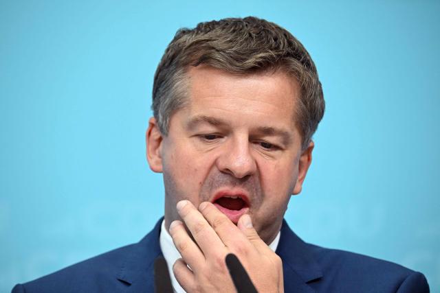 Saxony-Anhalt's State Premier Sven Schulze reacts during a press conference after the party's leadership meeting in Berlin on September 7, 2026, one day after regional elections in the eastern federal state of Saxony-Anhalt. (Photo by RALF HIRSCHBERGER / AFP)