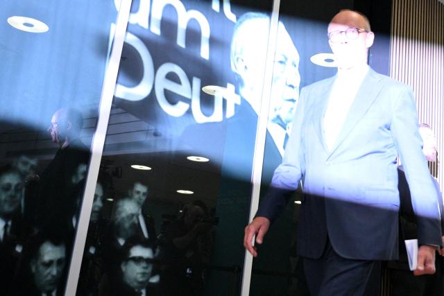 German Chancellor and leader of Germany's Christian Democratic Union (CDU) Friedrich Merz is hit by a flash light as he arrives to a press conference after the party's leadership meeting in Berlin on September 7, 2026, one day after regional elections in the eastern federal state of Saxony-Anhalt. (Photo by RALF HIRSCHBERGER / AFP)