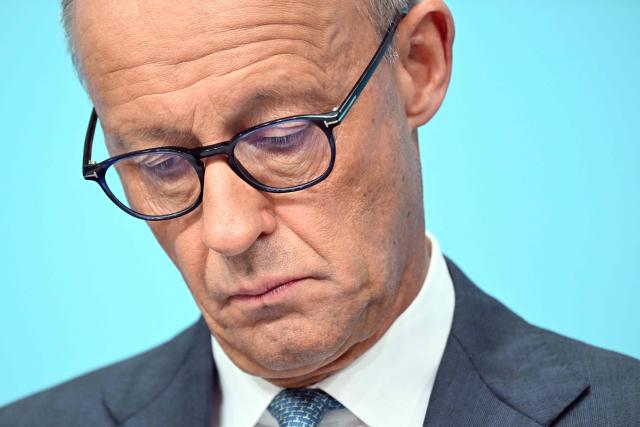 German Chancellor and leader of Germany's Christian Democratic Union (CDU) Friedrich Merz looks down during a press conference after the party's leadership meeting in Berlin on September 7, 2026, one day after regional elections in the eastern federal state of Saxony-Anhalt. (Photo by RALF HIRSCHBERGER / AFP)