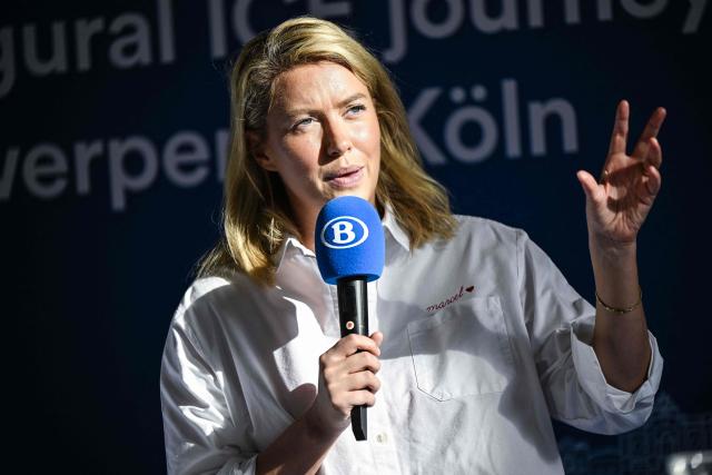 Dutch Belgian politician and mayor of Antwerp, Els Van Doesburg delivers a speech during a ceremony for the inaugural run of a new direct high speed rail link between Antwerp and Cologne, Germany, jointly operated by German rail company Deutsche Bahn and Belgian rail operator SNCB, at Antwerpen-Centraal railway station in Antwerp on September 7, 2026. (Photo by Tom Goyvaerts / Belga / AFP) / Belgium OUT