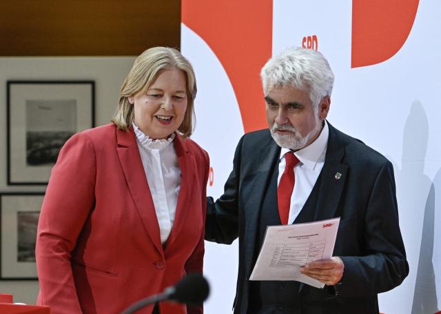 Armin Willingmann, top candidate of the Social Democratic SPD party for regional elections in Sachsen-Anhalt, and the SPD co-leader Baerbel Bas (L) leave after a press conference following an SPD leadership meeting in Berlin on September 7, 2026, one day after regional elections in the eastern federal state of Saxony-Anhalt. (Photo by Tobias SCHWARZ / AFP)