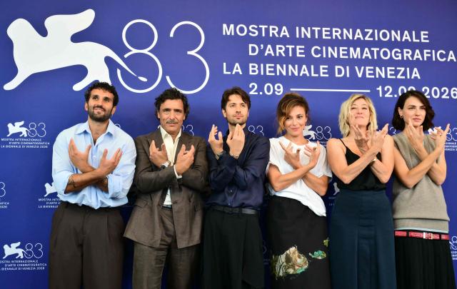 (From L) Italian actors Salvatore De Chirico, Adriano Giannini, Italian filmmaker Paolo Strippoli, Italian actresses Jasmine Trinca, Valeria Bruni Tedeschi and Romana Maggiora Vergano attend the photocall of "L’estranea" presented in competition at the 83rd International Venice Film Festival, at Venice Lido on September 7, 2026. (Photo by Stefano RELLANDINI / AFP)
