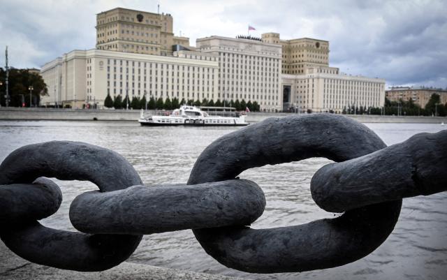 A cruise boat sails along the Moskva river past the Russian Defence Ministry headquarters in Moscow  on September 7, 2026. (Photo by Alexander NEMENOV / AFP)