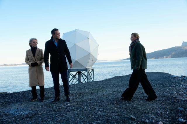Danish Prime Minister Mette Frederiksen (R), the President of the European Commission Ursula von der Leyen (L) and Greenland's head of government Jens-Frederik Nielsen (C) visit the company Eutelsat Oneweb in Nuuk, Greenland, on September 7, 2026. (Photo by Mads Claus Rasmussen / Ritzau Scanpix / AFP) / Denmark OUT
